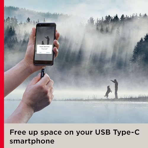 SanDisk high performance OTG storage drive compact design on a dark surface