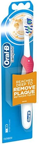 Oral-B battery powered electric toothbrush packaging detailing the premium dental care features.