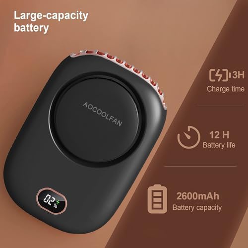 AOCOOLFAN mini desk fan standing upright on a table using the built-in back stand