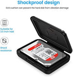 Multiple ORICO 3.5 inch external hard drive portable cases stacked vertically on a desk.