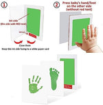 Detailed green puppy paw print on a white keepsake card created with a non toxic ink pad.