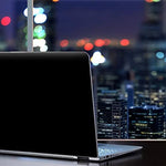 Close up view of the durable premium material quality and non glare texture of the solid black vinyl notebook wrap