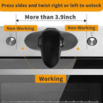 Black stove knob safety guards installed on a gas range