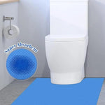 Demonstration of trimming the 24 by 22 inches disposable urine mat with scissors for a customized toilet base fit.