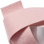 Adhesive moleskin roll for heel and toe friction protection during hiking.