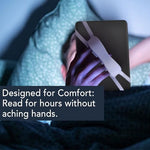 Ergonomic hand strap attached to Kindle Paperwhite for one-handed reading