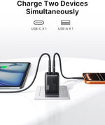 INIU GaN fast charger set powering an iPhone and a Samsung smartphone simultaneously