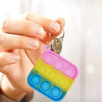 Clanam variety color mini fidget toys arranged neatly as party favors and classroom prizes