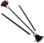 Close up view of the black and red balanced tassels on the Jolly Lama flower stick.