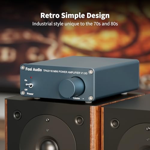 Fosi Audio V1.0G home audio amplifier alongside the included nineteen-volt power adapter and power cable accessory setup