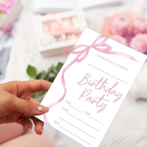 Close up of four by six inches pink bow party invitation showing ample writing space