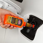 Close up of STP 2-in-1 fuel intake system cleaner bottle
