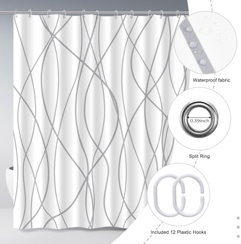 Hotel style bathroom setup featuring light filtering striped privacy shower curtain.