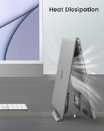 Ergonomic workspace layout with gray metallic auto adjustment laptop stand