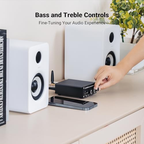 Fosi Audio Bluetooth 5.0 amplifier package contents including the twenty four volt power adapter and wireless antenna accessory.
