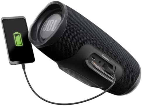 JBL Charge 4 speaker in outdoor setting lifestyle shot