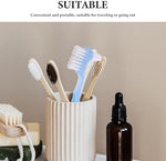 Side view highlighting the dual brush design for comprehensive cleaning of crevices and surfaces.