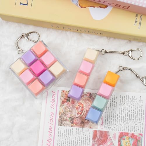 Three piece set of mechanical switch clicker buttons featuring one nine key grid and two four key keychains