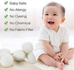 Reusable eco friendly white wool dryer spheres for pet hair and fur removal.