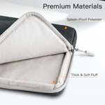 JETech slim electronic bag being placed into a travel backpack side view