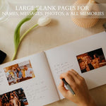 Open Zicoto wedding guestbook on a table with pen