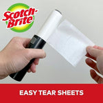 Miniature lint roller removing pet hair from a black suit jacket