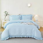 Side view of the matching light blue envelope pillowcase featuring ruffled trim details