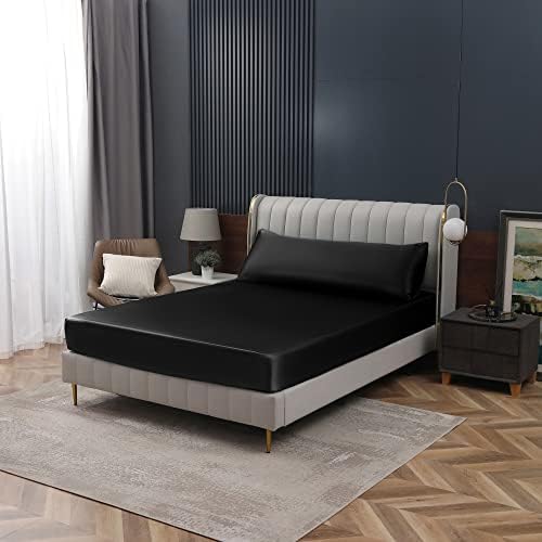 Bedroom interior featuring luxury black satin bed sheet aesthetic