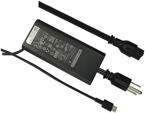 Side view of the Dell 65W Type C adapter displaying regulatory safety labels and serial information