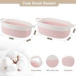OIAHOMY pink and white storage organizer filled with baby toys on a shelf