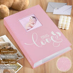 Close up of the embroidered text on the Lanpn baby shower keepsake photobook.