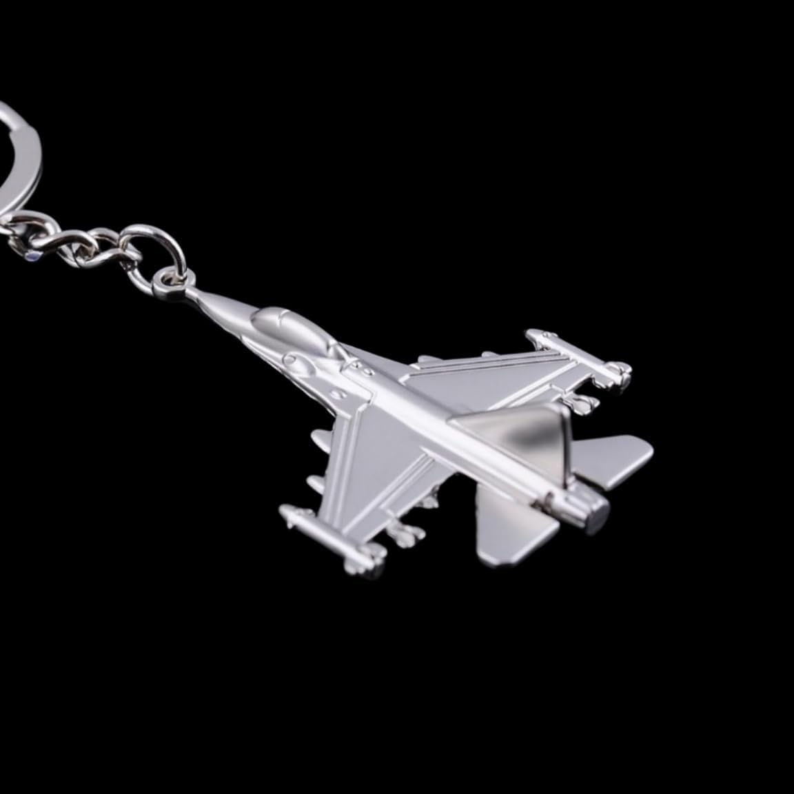 ODETOJOY airplane keychain attached to a backpack as a pendant