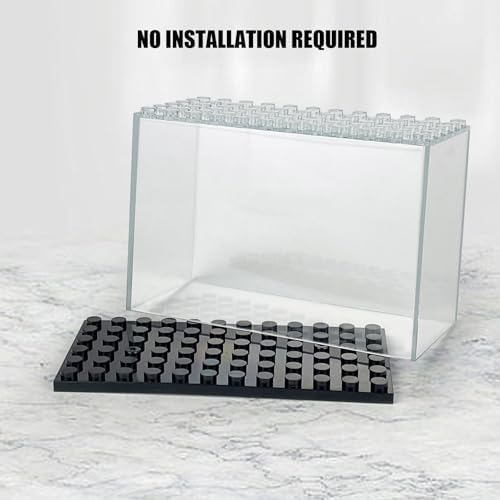 Multiple display boxes stacked vertically on a desk