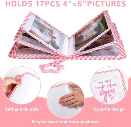 ZOIIWA pink bow infant photo album highlighting the attached star shaped teether toy