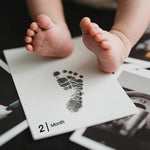 Monthly milestone cards for recording first year baby growth in India