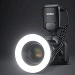 Godox ML-150II controller unit displaying the clear LCD interface screen and power adjustment buttons.