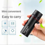 Side angle of the black CFDGEVX handheld pocket single tube telescope showcasing the ergonomic rubberized grip texture.