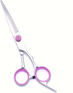 PAWCHIE pet grooming kit highlighting the adjustable tension screw and pink ergonomic finger rings.