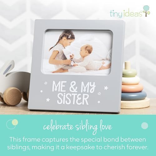 Tiny Ideas sibling keepsake photo frame placed on a modern nursery tabletop shelf