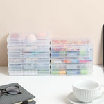 Clear plastic craft supply containers for desk organization