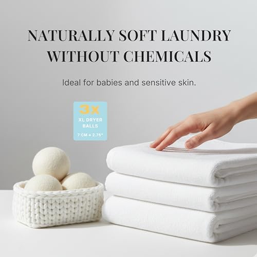 Littlest Forest eco friendly New Zealand wool tumble balls inside a washing machine drum softening garments naturally