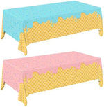 Two rectangular ice cream theme plastic tablecloths folded