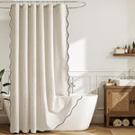 Full length view of the heavy duty farmhouse bath drapery hanging by a bathtub