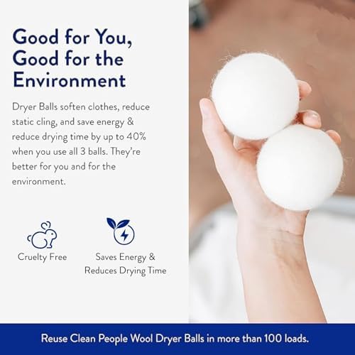 Three jumbo white wool dryer balls for energy saving laundry care
