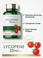 Close up view of Carlyle Lycopene 120 quick release softgels on an unflavored capsule texture