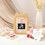 Interactive baby shower game setup with wooden box