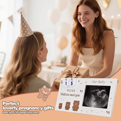 Nursery wall display featuring the bear themed sonogram frame alongside baby nursery decorations.