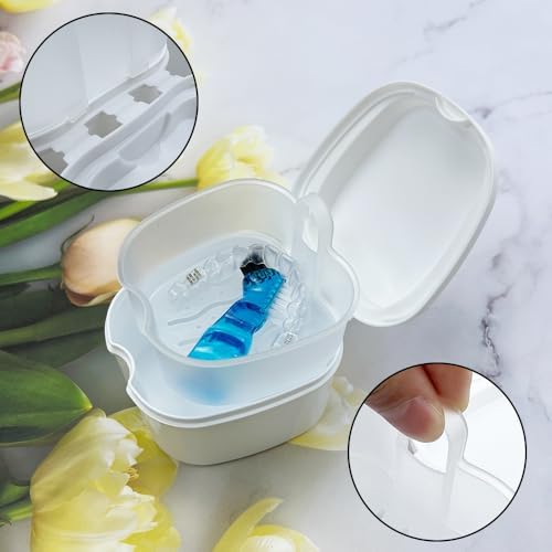 Two piece set of denture cleaning cups with strainer trays