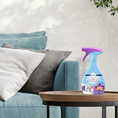 Febreze Gain Moonlight Breeze fabric spray application on sofa