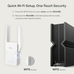 TP-Link range extender connected to a home wall outlet